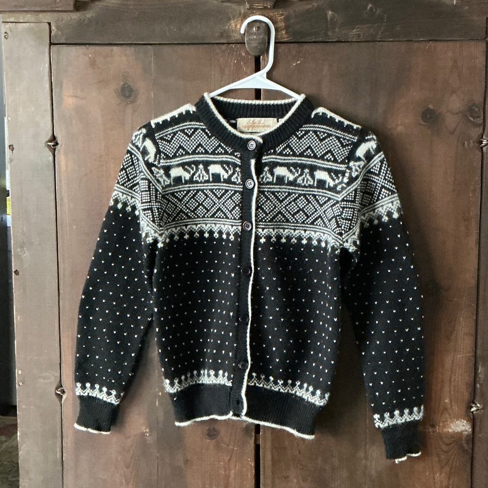Woman’s Black and White Patterned Sweater